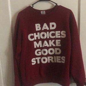 “Bad choices make good stories” red pullover